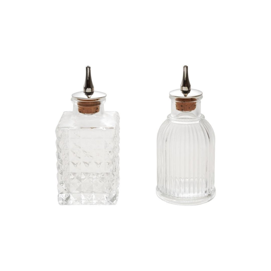 "5""H 2 oz. Glass Bitters Bottle w Cork Stopper, 2 Styles" - CREATIVE COOP - Compralo en CorinneRegalos.com