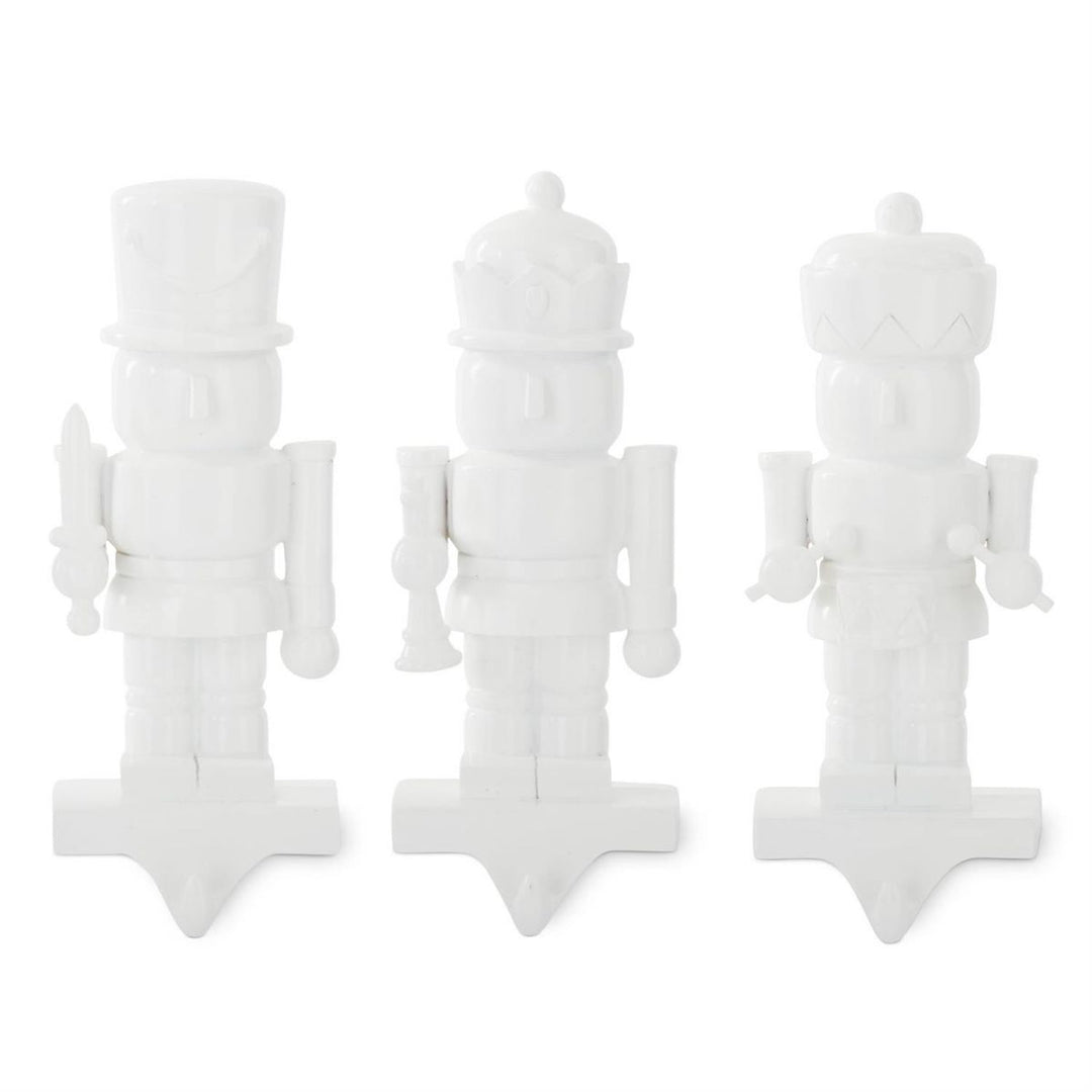[6/36] | ASSORTED WHITE RESIN NUTCRACKER STOCKING HOLDERS (3 - K&K INTERIORS - Compralo en CorinneRegalos.com