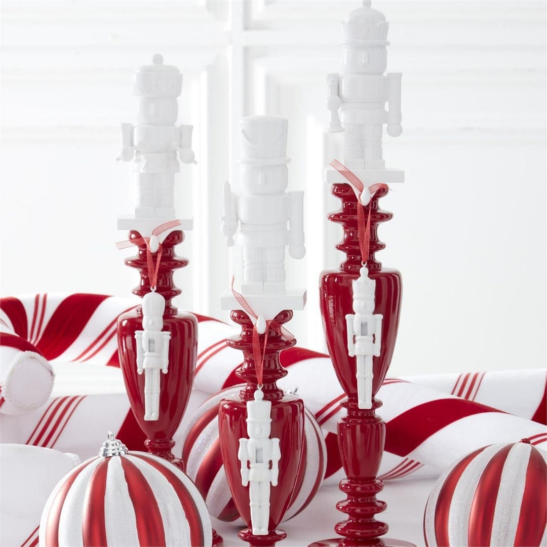 [6/36] | ASSORTED WHITE RESIN NUTCRACKER STOCKING HOLDERS (3